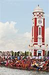 Crowd on ghat in front of a clock tower at River Ganges, Malviya Dwipa, Haridwar, Uttarakhand, India