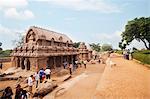 Tourists at ancient Pancha Rathas temple, Mahabalipuram, Kanchipuram District, Tamil Nadu, India