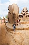 Tourists at ancient Pancha Rathas temple, Mahabalipuram, Kanchipuram District, Tamil Nadu, India