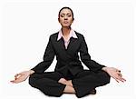 Close-up of a businesswoman meditating