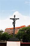 Crucifix in a city, Cesky Krumlov, South Bohemian Region, Czech Republic