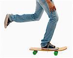 Low section view of a man skateboarding