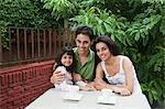 Girl smiling with her parents