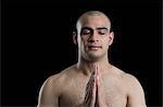 Close-up of a man meditating