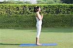 Woman doing Surya Namaskar (Sun Slautation)