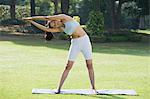 Woman exercising in a park