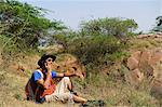 Hiker talking on a mobile phone