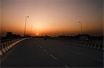 Road at sunset, National Highway 8, Gurgaon, Haryana, India