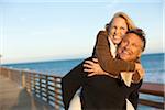 Mature Couple having Fun Walking along Pier, Jupiter, Palm Beach County, Florida, USA