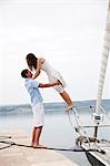 Croatia, Young couple in port having fun