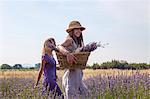 Young Women Walking Through Lavender Field, Croatia, Dalmatia, Europe