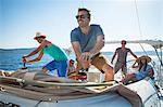 Croatia, Adriatic Sea, Young people on sailboat