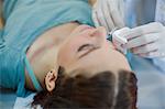 Woman Getting A Botox Injection On Her Face