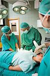 Medical team of surgeon working in a surgical room