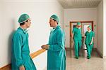 Surgeons speaking in the corridor in a hospital