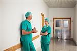 Surgeons talking in the corridor in a hospital