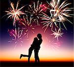 happy young couple with fireworks background