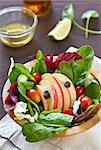 Apple with spinach  and raisin salad by vinaigrette