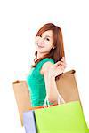 happy young woman with shopping bags