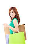 smiling young woman with shopping bags