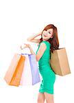 happy young  woman holding shopping bag