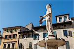 Fountain and Statue of Madonna on Piazza delle Erbe in Verona, Veneto, Italy