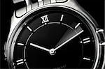 Analog wrist watch closeup with minute pointer in movement, Time flies concept