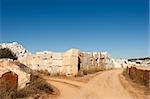 Marble blocks alongside a dirt road in the marble region of Borba, Alentejo, Portugal