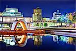 Cenotaph through which the Atomic Dome can be seen at at Peace Memorial Park in Hiroshima, Japan.