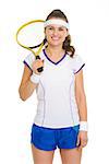 Portrait of smiling female tennis player with racket