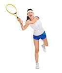 Full length portrait of female tennis player hitting ball