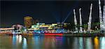 SINGAPORE, SINGAPORE - MAR 13 : Nightlife at Clarke Quay Along Singapore River Panorama on Mar 13, 2013. A popular tourist attraction in Singapore with boat rides restaurants night clubs and shopping mall.