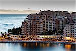 Aerial View on Illuminated Fontvieille and Monaco Harbor, French Riviera