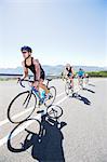 Cyclists in race on rural road