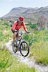 mountain biker on dirt path