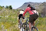 mountain bikers on dirt path