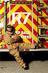 Fire Fighter Sitting on Back of Fire Truck, Ontario