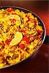 A picture of a fresh home made paella served on a frying pan