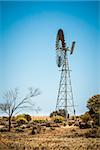 An image of a farming windmill in the australian outback
