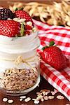 Fresh yogurt with oat flakes and berries.