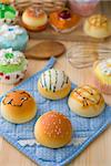 sweet vanilla bun cake bread with pastry decorations as background