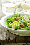 salad with pear, walnuts and cheese camembert