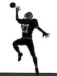 one caucasian american football player man catching receiving in silhouette studio isolated on white background