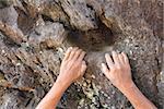 Hands of a rock climber
