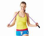 Attractive girl with a skipping rope on a white background