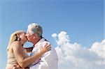 Elderly couple in love, honeymoon with old man and woman kissing. Copy space