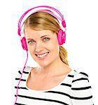 Attractive cheerful caucasian woman listening and enjoying music in headphones