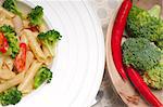 classic Italian penne pasta with broccoli and red chili pepper