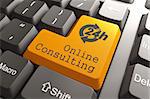 Online Consulting. Orange Button on Computer Keyboard. Internet Concept.