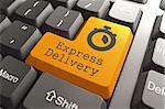 "Express Delivery" - Orange Button on Computer Keyboard. Business Concept.